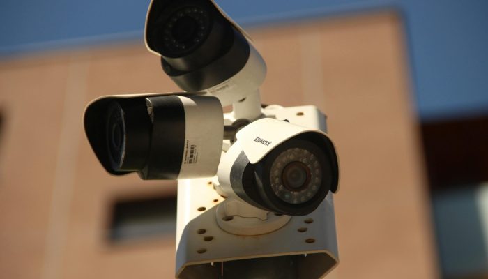 High-resolution surveillance cameras installed in a city environment for security purposes.